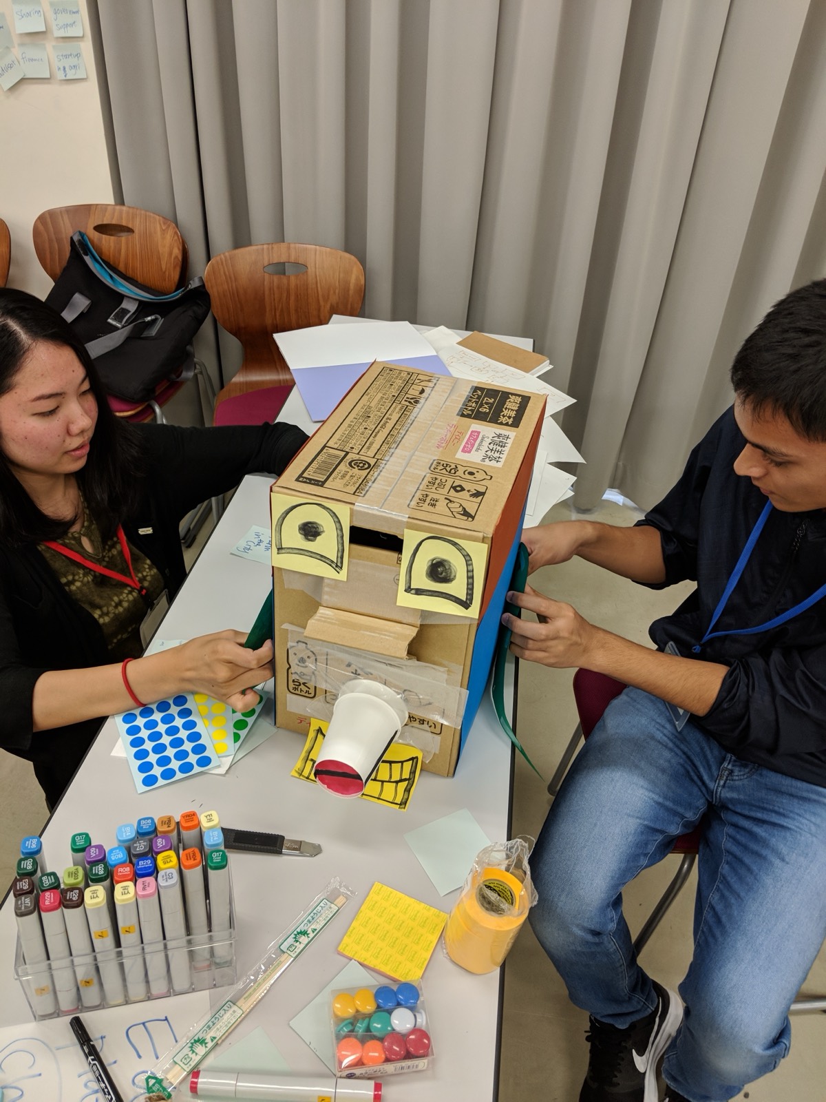 Team building the GachaBot physical machine