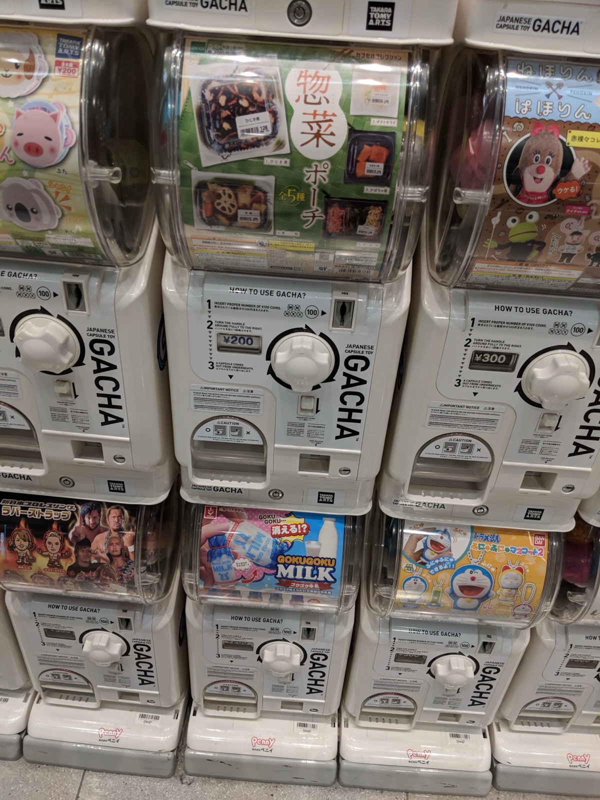 A wall of gacha capsule vending machines in Japan